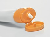 ATADAN Opalovacie mlieko s karabínkou SPF 30, objem 30 ml, oranžová